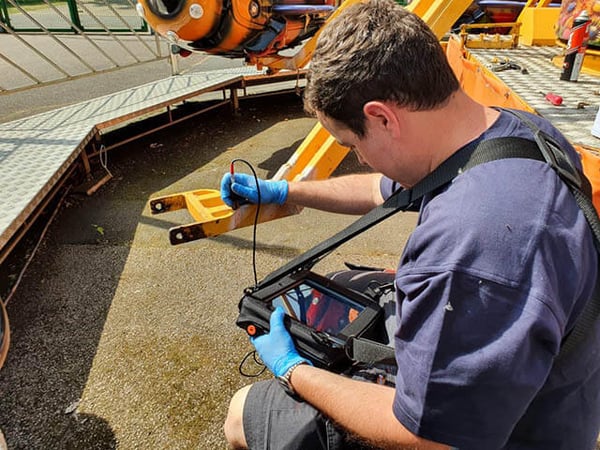 synchronization of optical inspection devices